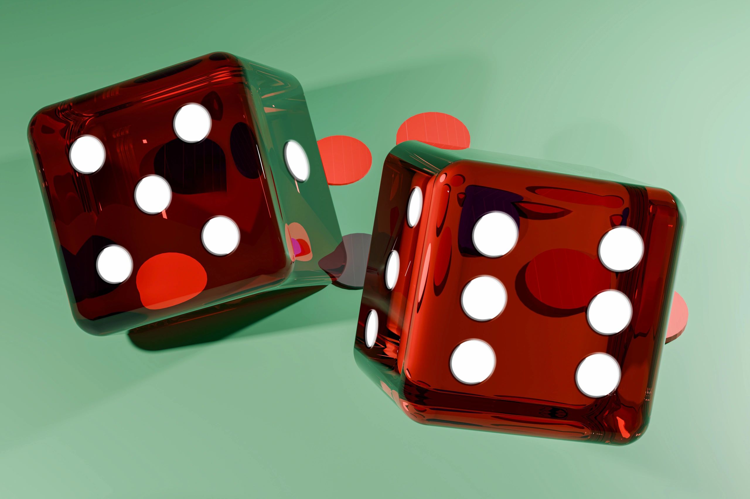 Red dice on a green background